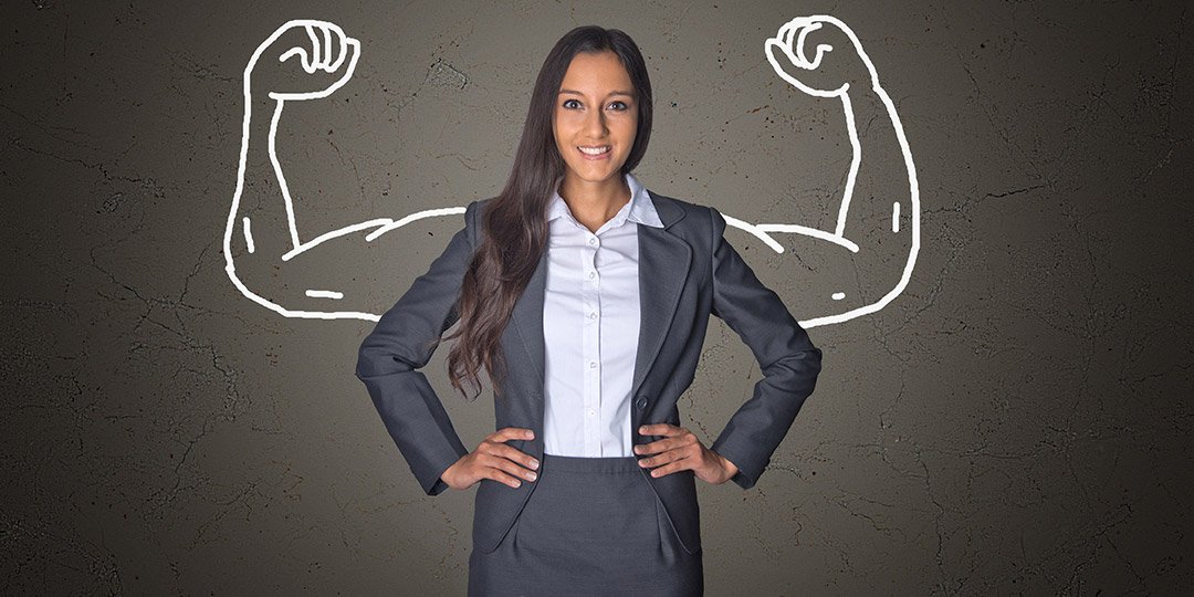 building confidence in sales - a woman standing with a drawing of strong arms 